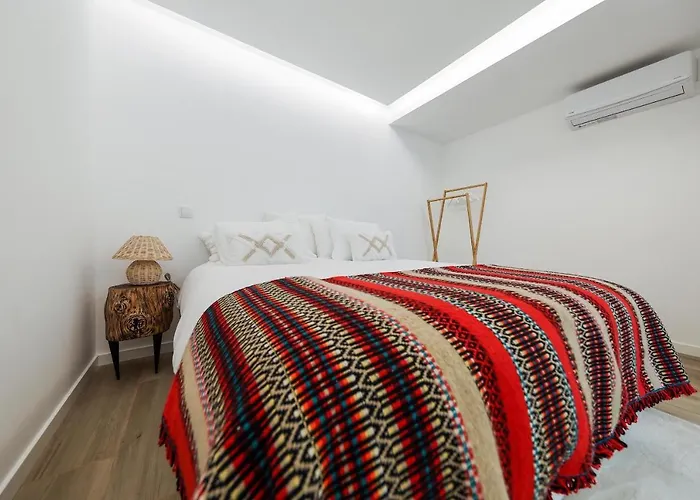 Estudio Candida, One Place … Daire Nazaré